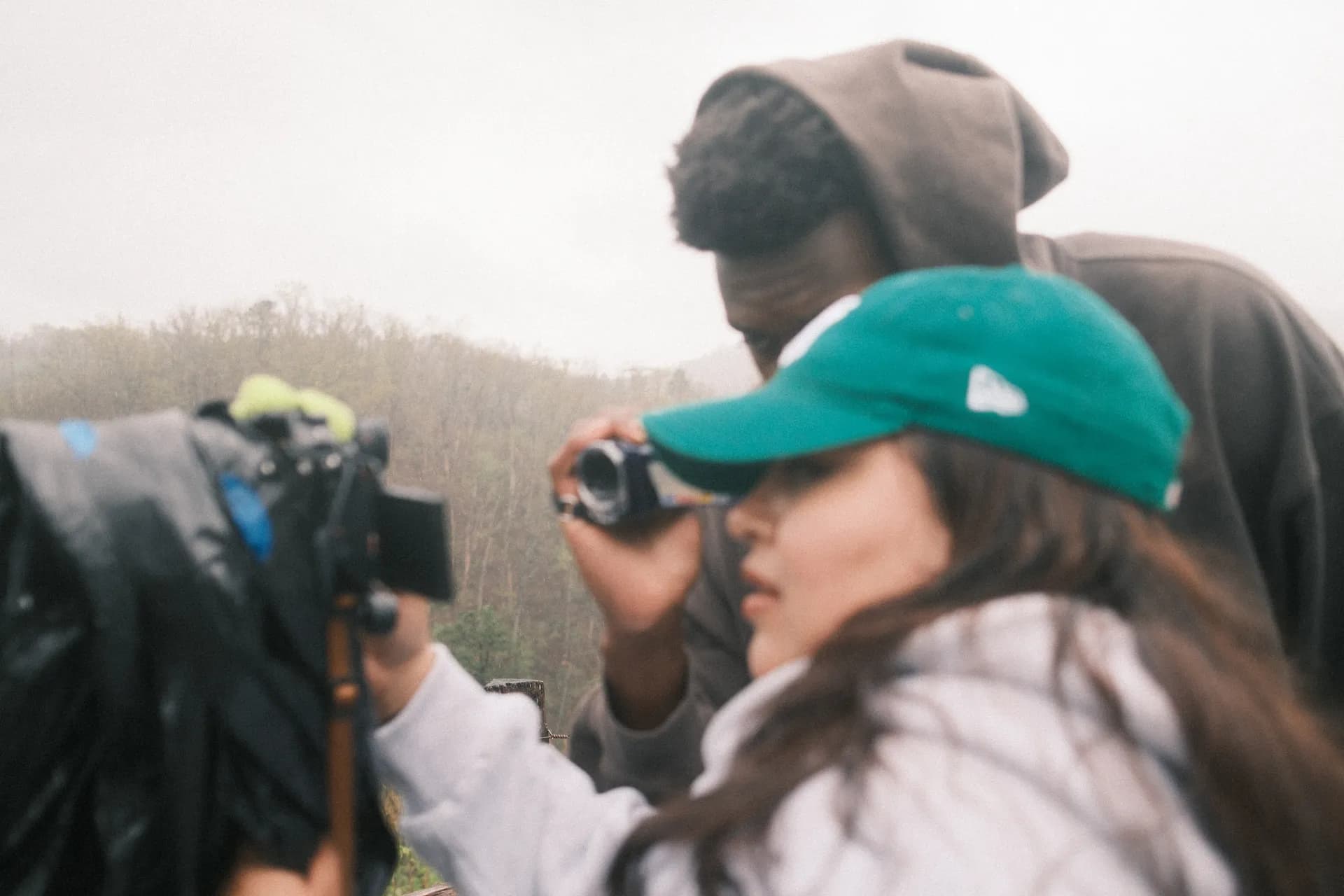 Creators filming together in the mist on the retreat